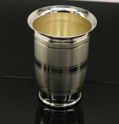 Pure 999 fine silver handmade water and milk tumbler, silver flask, and baby silver utensils by TRIBAL ORNAMENTS.