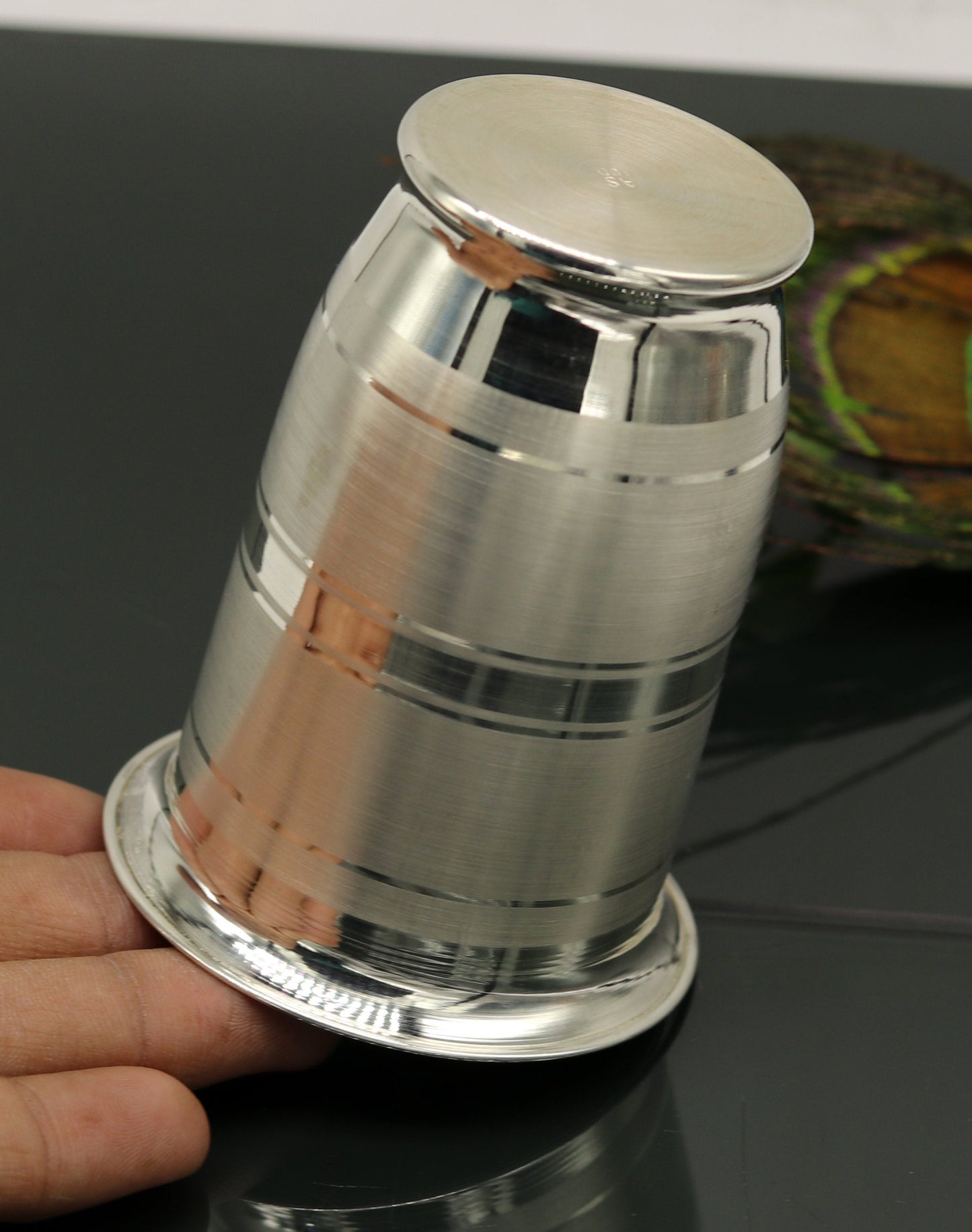 Pure 999 fine silver handmade water and milk glass tumbler, silver flask, and kids utensils from Tribal Ornaments.