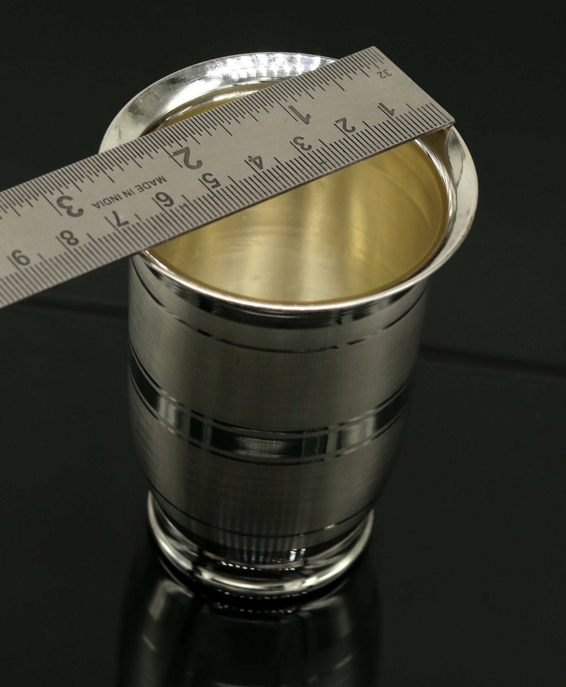 Handmade Pure 999 fine silver water and milk tumbler, silver flask, and kids' silver utensils from TRIBAL ORNAMENTS.
