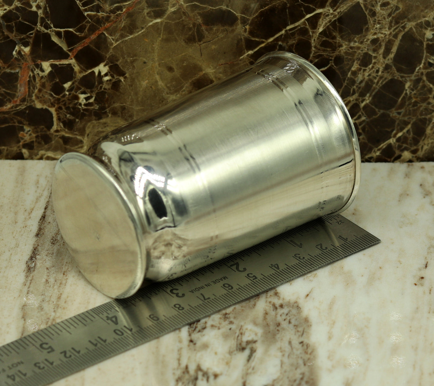 Pure 999 fine silver handmade water and milk tumbler, silver flask, and baby silver utensils from TRIBAL ORNAMENTS.