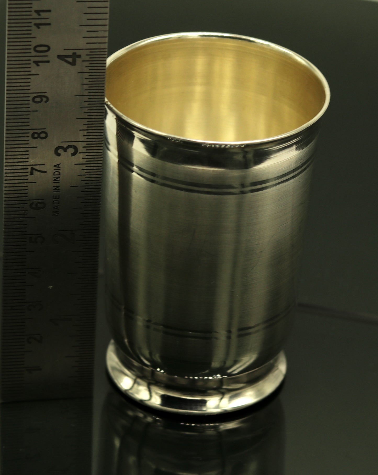 Pure 999 fine silver handmade water and milk glass tumbler, silver flask, and baby silver utensils by TRIBAL ORNAMENTS.