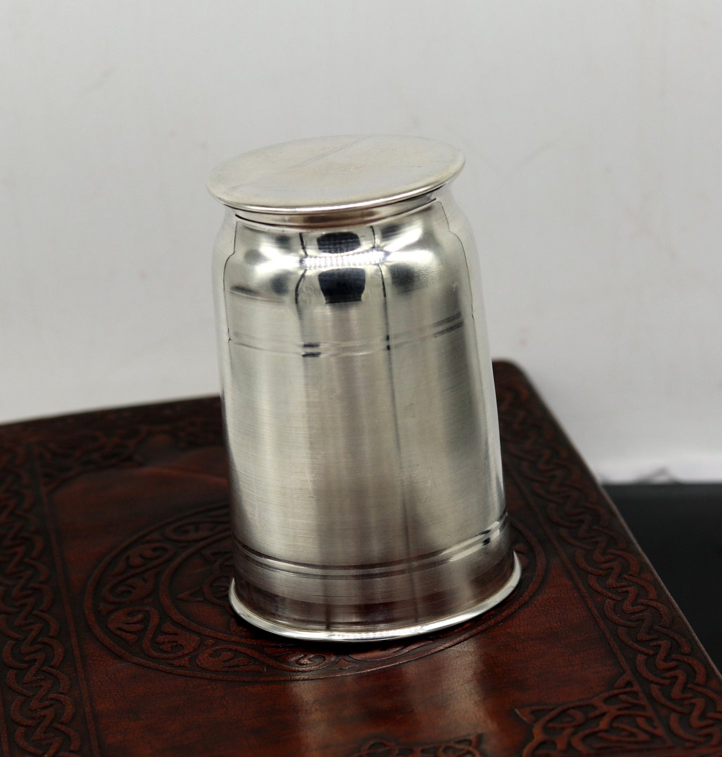 Handmade Pure 999 fine silver water and milk glass tumbler, silver flask, and kids utensils by TRIBAL ORNAMENTS.