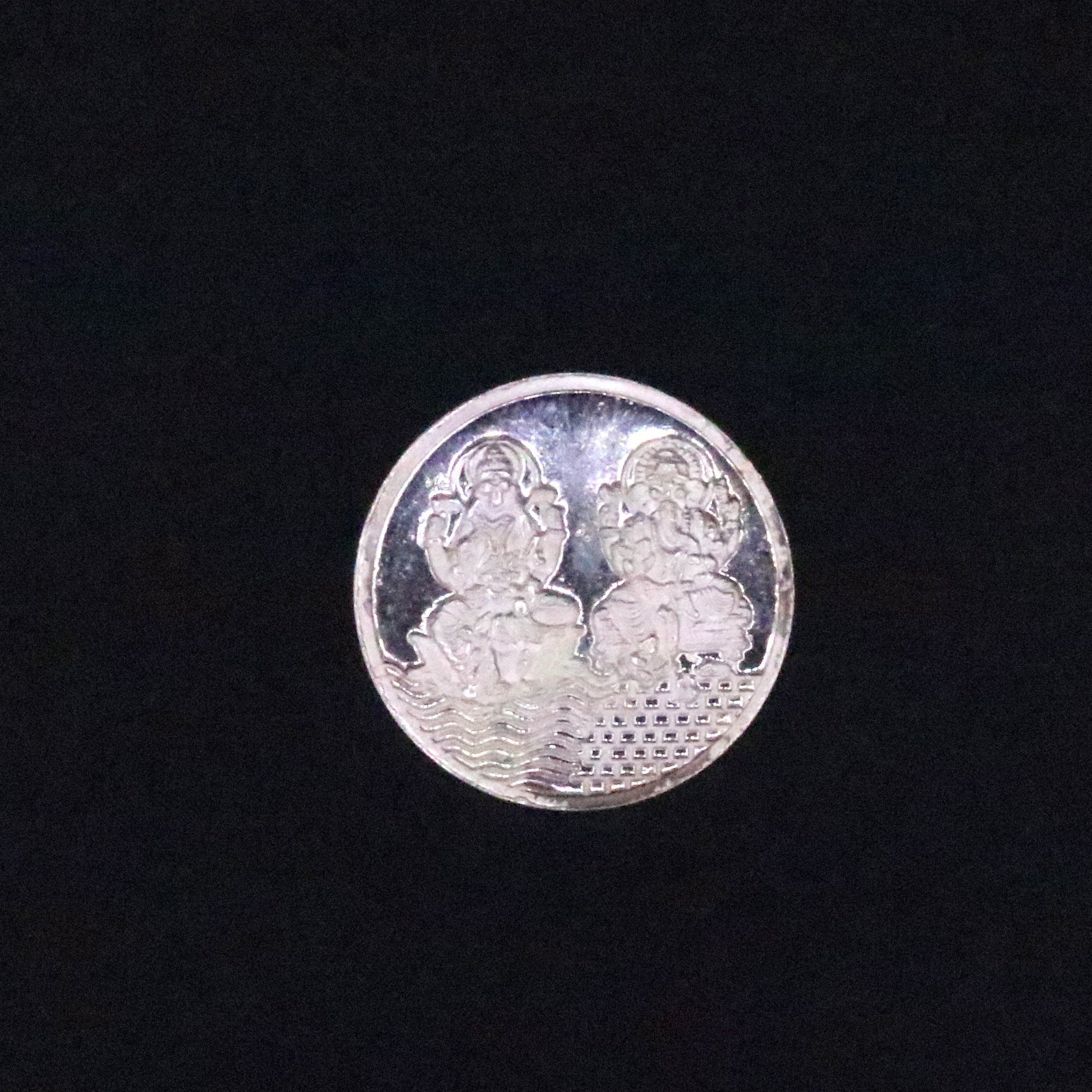 Pure solid 999 silver coin featuring Lord Ganesha and Laxmi print, Indian idol collectible and gifting coin by Tribal Ornaments.