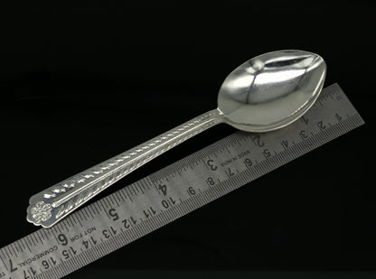 Handmade 6-inch sterling silver spoon from Tribal Ornaments, showcasing its polished surface and traditional design for kitchen use.