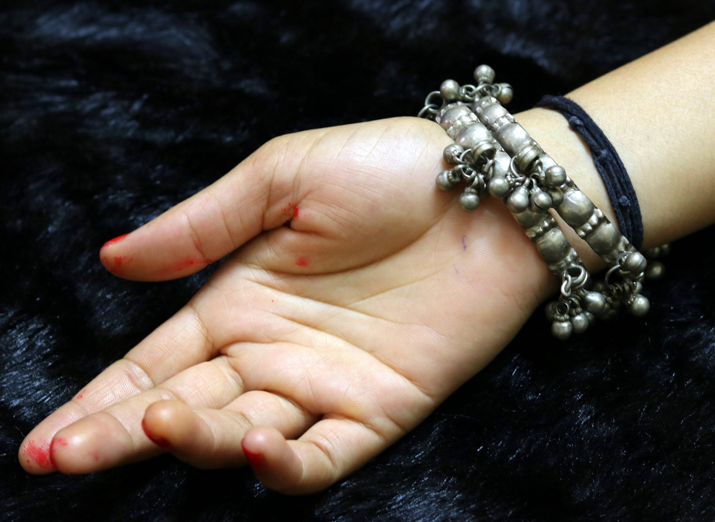 Vintage Rajasthan solid silver women's bangle bracelet with tiny bells and intricate ethnic design, handmade tribal jewelry.