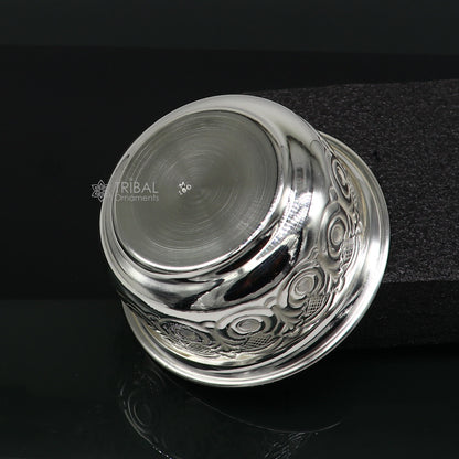Silver handmade work bowl with intricate design, used for rice ceremonies and puja rituals, part of silver worshipping utensils set.