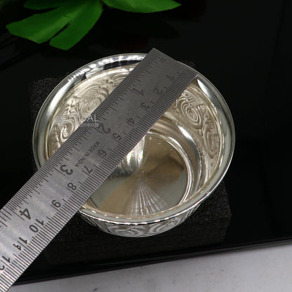 Silver handmade work bowl and utensils for rice ceremony, Annaprasan, and puja, featuring intricate tribal design by TRIBAL ORNAMENTS.