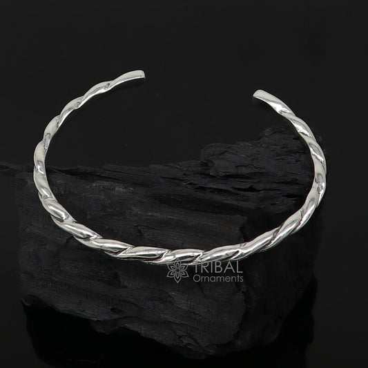 Solid 4mm 925 sterling silver twisting design cuff bracelet by TRIBAL ORNAMENTS, modern trendy unisex bangle jewelry.