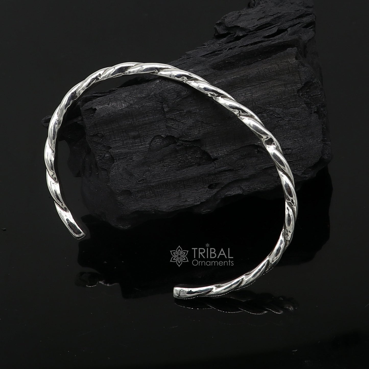 Sterling silver twisting design cuff bracelet by Tribal Ornaments, modern unisex bangle with 4mm thickness and trendy style