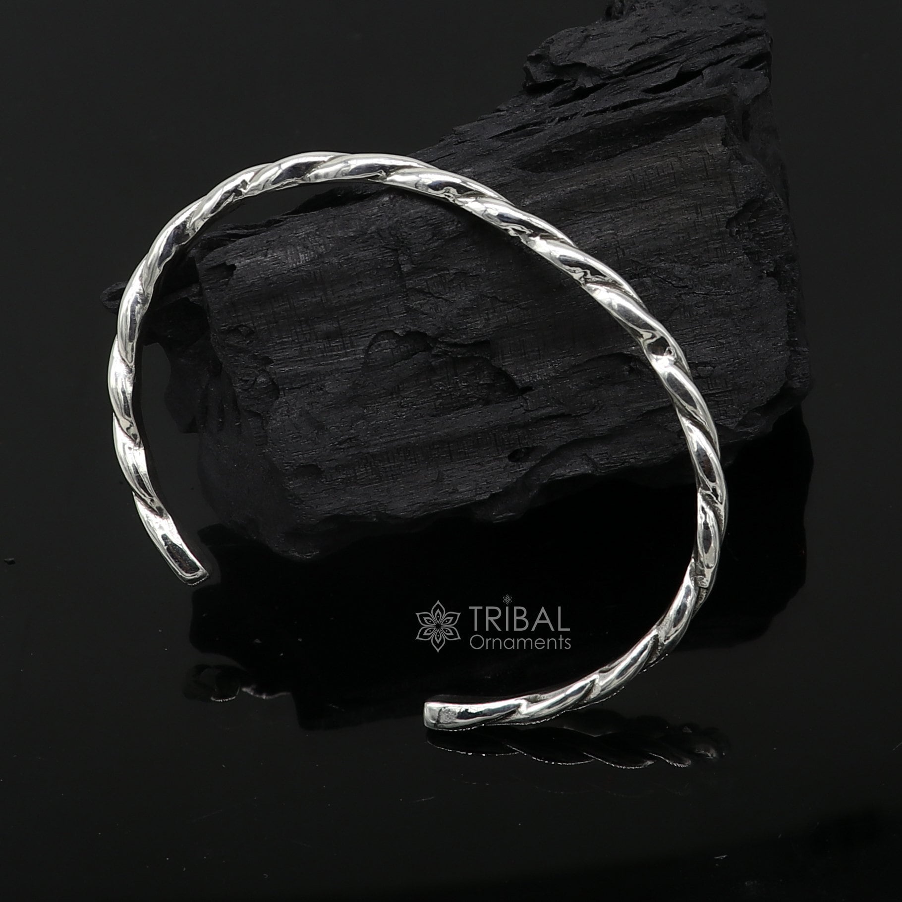 Sterling silver twisting design cuff bracelet by Tribal Ornaments, modern unisex bangle with 4mm thickness and trendy style