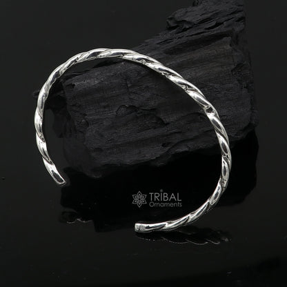 Sterling silver twisting design cuff bracelet by Tribal Ornaments, modern unisex bangle with 4mm thickness and trendy style