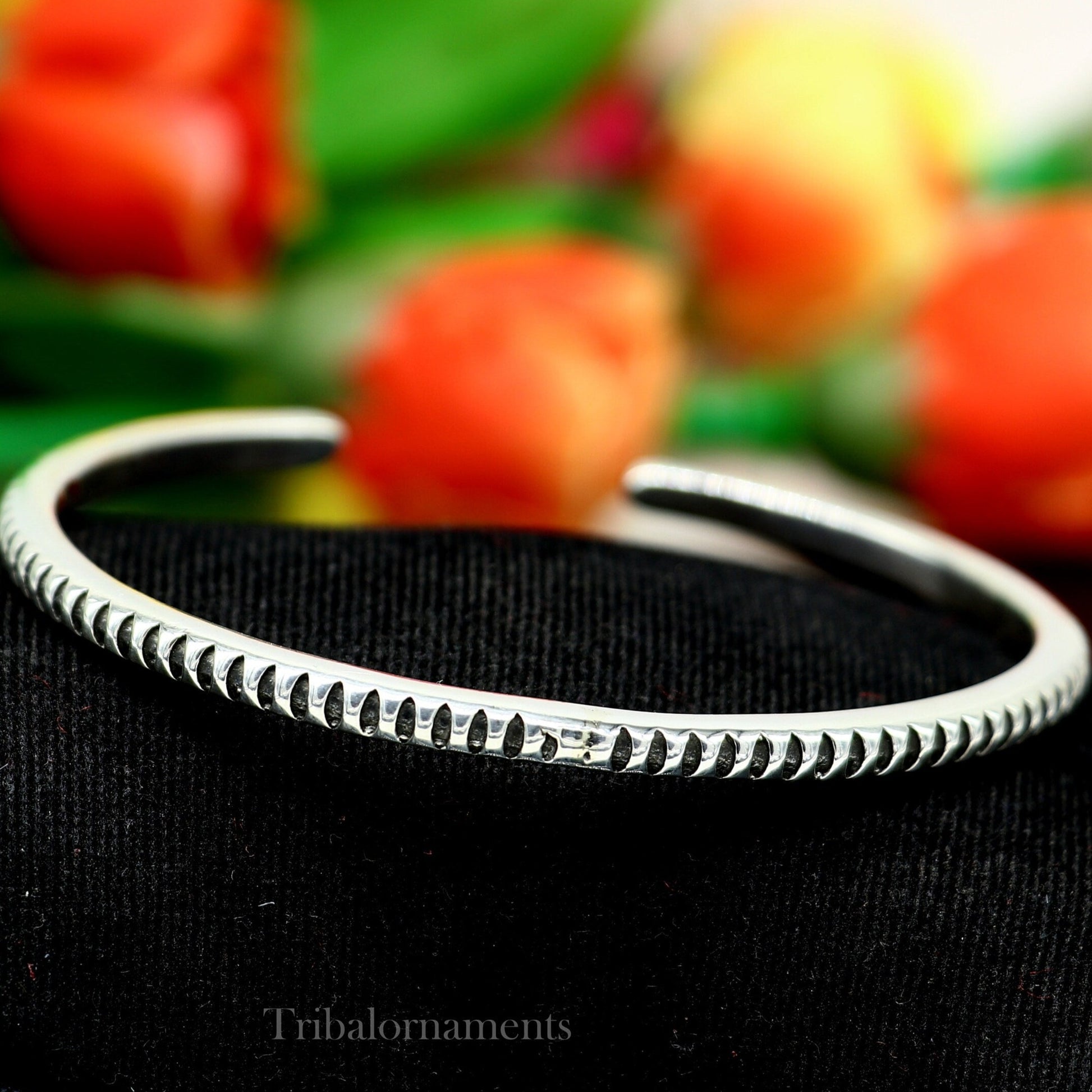 Unisex 925 sterling silver adjustable cuff bracelet by Tribal Ornaments, featuring a sleek solid design with handcrafted Indian style.