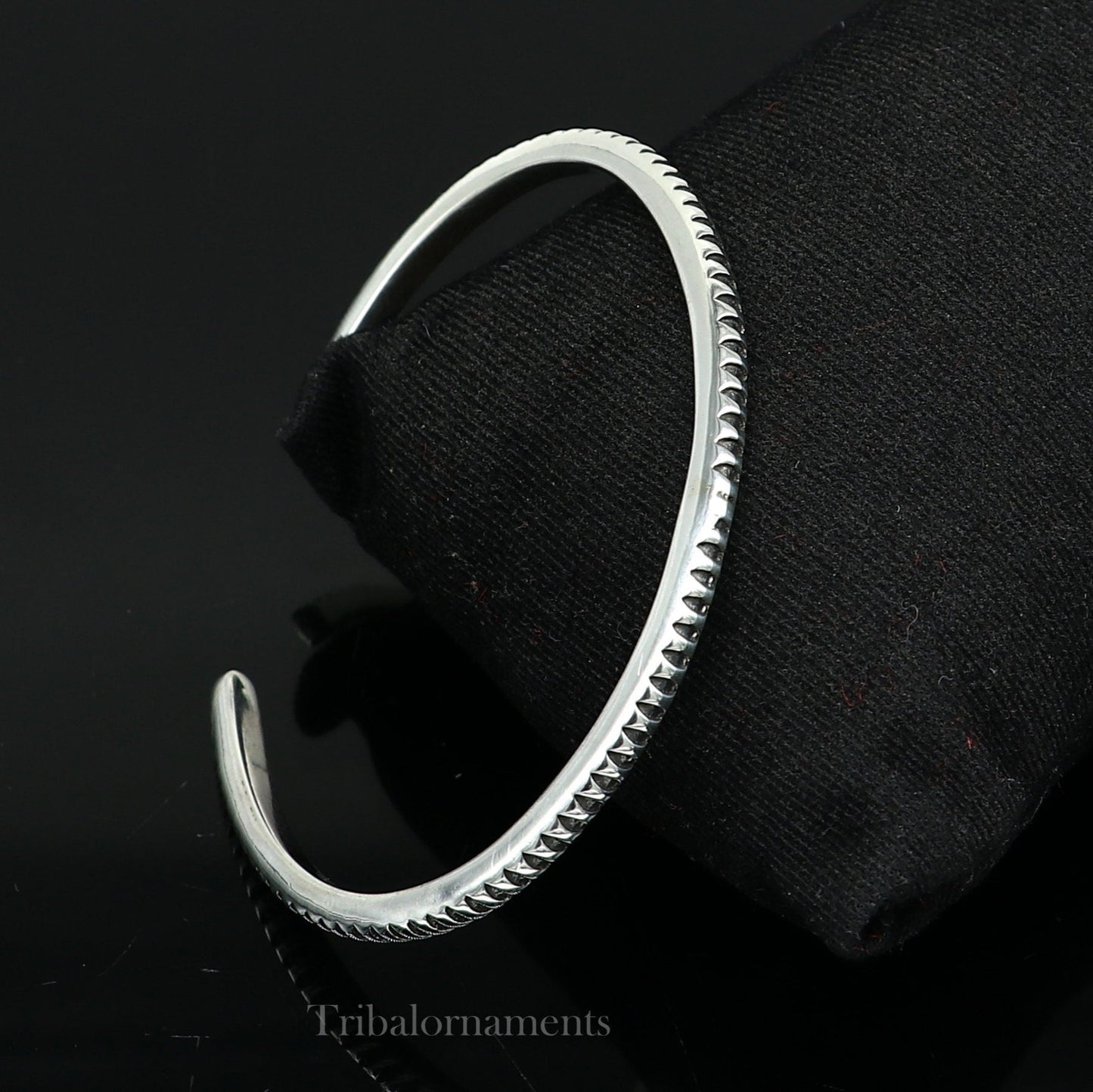 925 sterling silver adjustable cuff bangle bracelet by TRIBAL ORNAMENTS, featuring a handmade unisex design with tribal-inspired details.