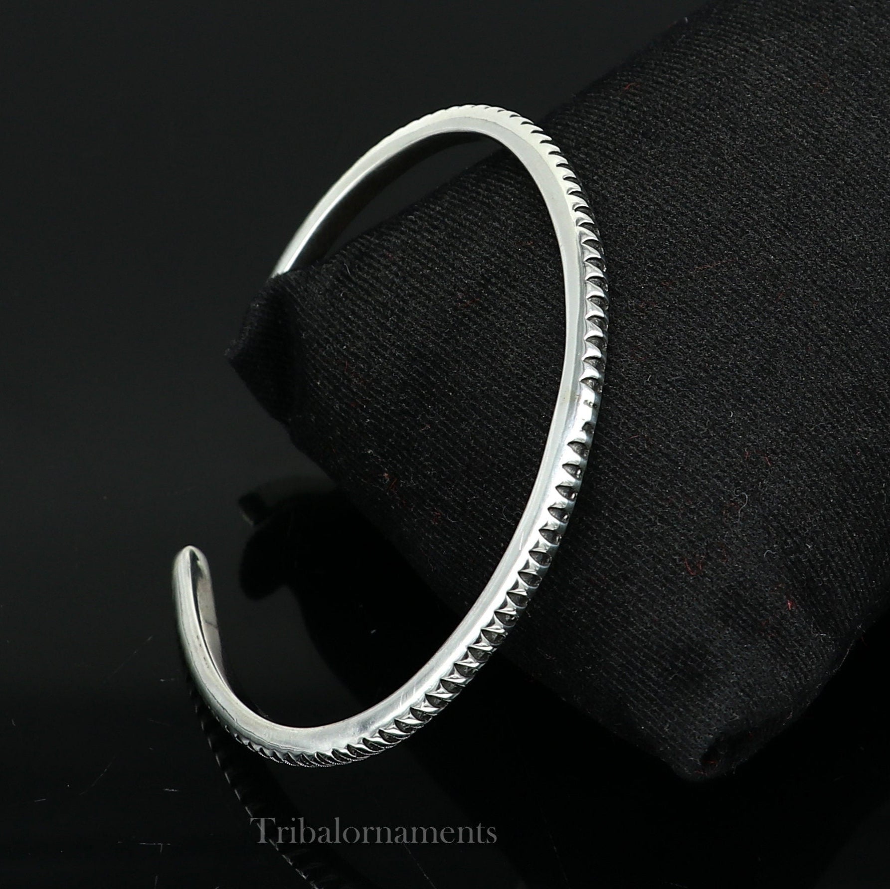 925 sterling silver adjustable cuff bangle bracelet by TRIBAL ORNAMENTS, featuring a handmade unisex design with tribal-inspired details.