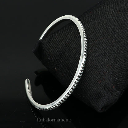 925 sterling silver adjustable cuff bangle bracelet by TRIBAL ORNAMENTS, featuring a handmade unisex design with tribal-inspired details.