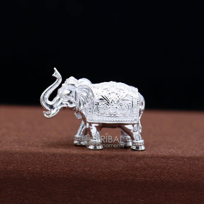 Solid 925 sterling silver elephant figurine with handmade design, suitable for puja, wealth, and prosperity, by Tribal Ornaments.