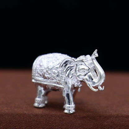 Solid 925 sterling silver handmade elephant statue, upper trunk design, puja figurine for wealth and prosperity by Tribal Ornaments.