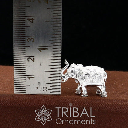 Solid 925 sterling silver handmade elephant figurine, small trunk-up statue ideal for puja, prosperity, and wealth rituals.