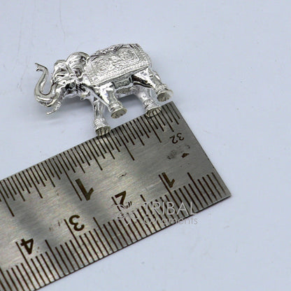 Solid 925 sterling silver handmade elephant figurine, small trunk-up puja statue for wealth and prosperity, by Tribal Ornaments.