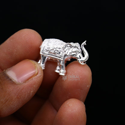 Handmade solid 925 sterling silver elephant figurine with an upper trunk design, ideal for puja, prosperity, and gift-giving.
