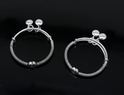 Sterling silver designer baby adjustable bangles bracelet with intricate tribal patterns and charming details, crafted by TRIBAL ORNAMENTS.