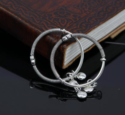Sterling silver stylish designer baby adjustable bangles bracelet with charm, handmade by TRIBAL ORNAMENTS.