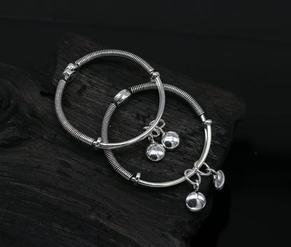 Sterling silver designer baby adjustable bangles bracelet with stylish charm, handmade by TRIBAL ORNAMENTS for kids.