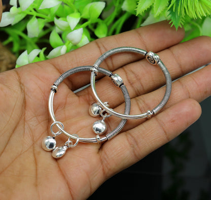 Sterling silver designer baby adjustable bangles bracelet with stylish charm, handmade jewelry by Tribal Ornaments for kids.