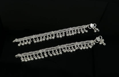 Solid pure silver baby anklet with noisy jingle bells, handmade flexible chain, ideal for newborns and kids jewelry by Tribal Ornaments.