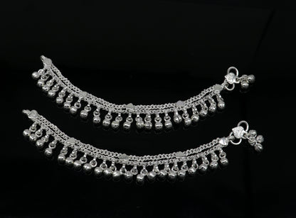 Solid pure silver baby anklet with noisy jingle bells, handmade flexible chain for newborns, jewelry gift from Tribal Ornaments.