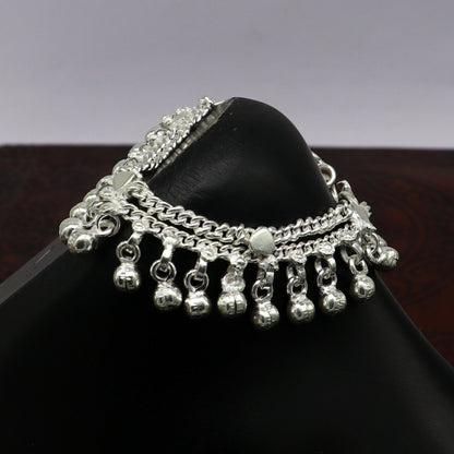 Solid pure silver baby anklet with noisy jingle bells, handmade flexible chain jewelry for newborns, by TRIBAL ORNAMENTS.