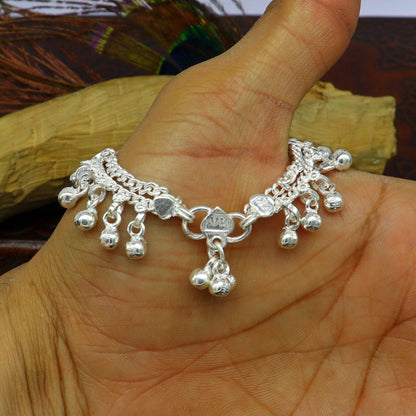 Solid pure silver baby anklet with noisy hanging jingle bells, handmade flexible chain, ideal for newborn kids jewelry by Tribal Ornaments.