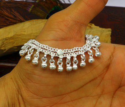 Solid pure silver baby anklet with flexible chain and noisy jingle bells, handmade tribal jewelry for newborns.