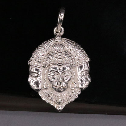 Solid silver Lord Hanuman pendant with three faces, handcrafted Indian jewelry by Tribal Ornaments, featuring traditional design.
