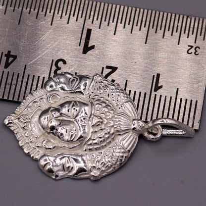 Solid silver Lord Hanuman three-face pendant jewelry from Tribal Ornaments, featuring intricate handmade Indian deity design.