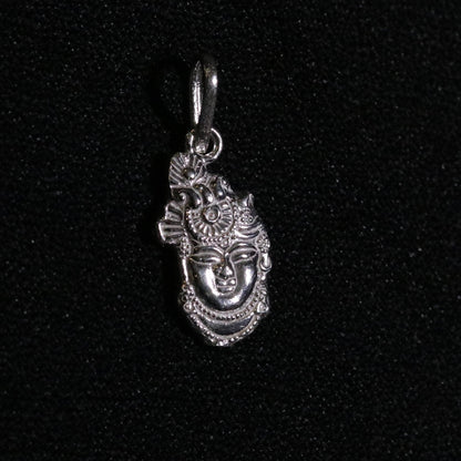Solid silver Shreenathji idol pendant by Tribal Ornaments, handmade Indian Vishnu god jewelry for unisex wear.