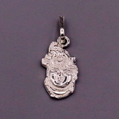 Solid silver Shreenathji pendant from Tribal Ornaments featuring a handmade Indian Vishnu idol design, unisex jewelry accessory.
