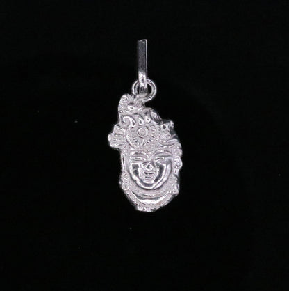 Solid silver Shreenathji pendant from Tribal Ornaments, handcrafted Indian idol jewelry depicting Lord Vishnu, unisex design.