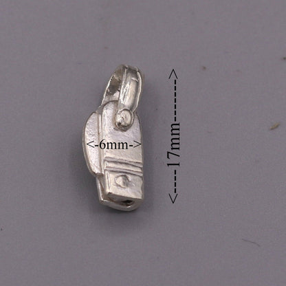 Solid silver small knife pendant by TRIBAL ORNAMENTS, handcrafted jewelry for protection and negative energy shielding.