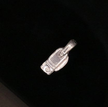 Solid silver small knife pendant by TRIBAL ORNAMENTS, handmade jewelry for protection from negative energy, featuring a tiny knife design.