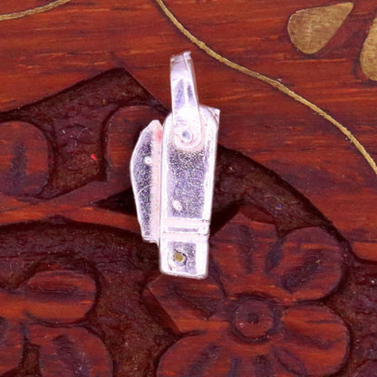 Solid silver small knife pendant by TRIBAL ORNAMENTS, handmade jewelry for protection against negative energy, featuring intricate tribal design.