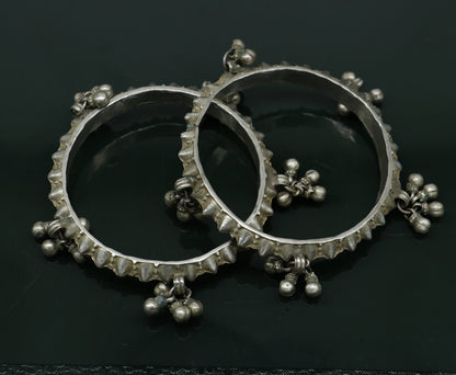 Solid silver vintage Banjara bangle bracelet with jingling bells, traditional Indian tribal jewelry for girls.