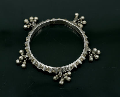 Solid silver vintage Banjara bangle bracelet with jingling bells, traditional Indian tribal jewelry for girls by TRIBAL ORNAMENTS.