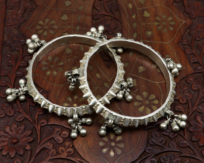 Solid silver vintage Banjara bangle bracelet with jingling bells, traditional Indian tribal jewelry for girls.