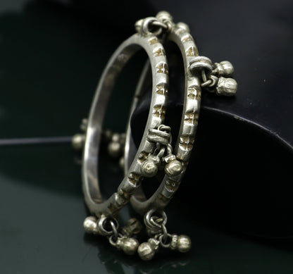 Solid silver vintage Banjara bangle bracelet with jingling bells, traditional Indian tribal jewelry for girls.
