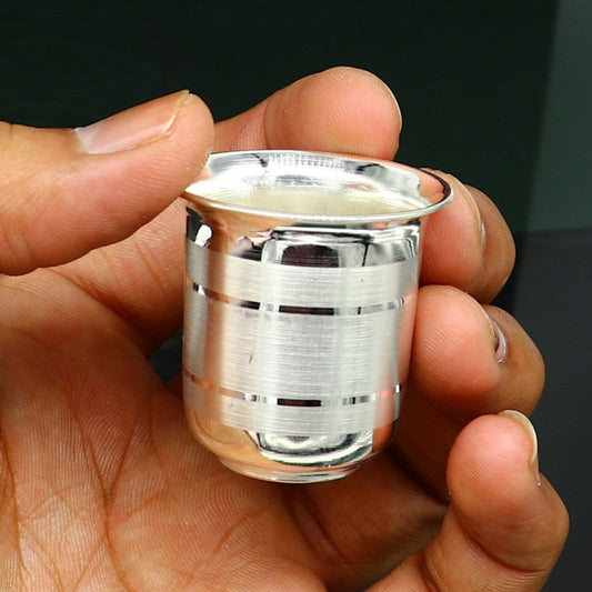 Solid silver handmade water and milk tumbler and baby silver cup by TRIBAL ORNAMENTS, featuring traditional silver utensils for health.