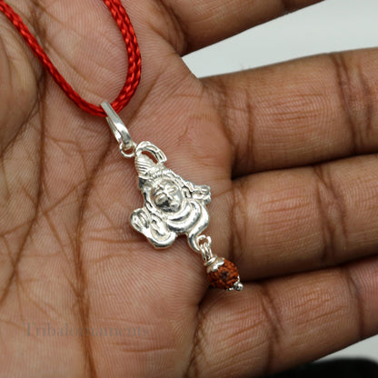 Sterling silver Lord Shiva pendant with hanging Rudraksha bead, detailed Hindu idol jewelry by Tribal Ornaments.