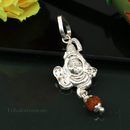Sterling silver Lord Shiva pendant with hanging rudraksha bead, detailed Hindu idol jewelry, handcrafted by Tribal Ornaments.