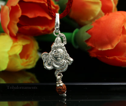 Solid sterling silver Lord Shiva pendant with hanging Rudraksha, detailed Hindu idol design, custom jewelry by TRIBAL ORNAMENTS.
