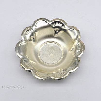 Handcrafted sterling silver bowl from TRIBAL ORNAMENTS, lightweight puja utensil with intricate silver craftsmanship.